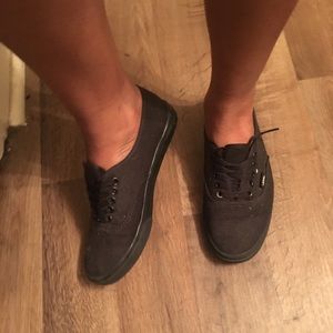 Well worn black vans